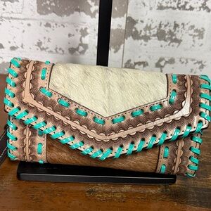 Elegant Brown and Cream Clutch with Turquoise Details